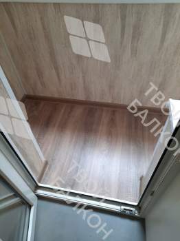 Холодное остекление и отделка П-образного балкона